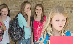 A child with a sad expression on their face